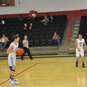 Basketball players playing a game