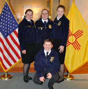 Four smiling students