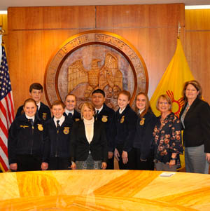 Group of students and staff members posing together